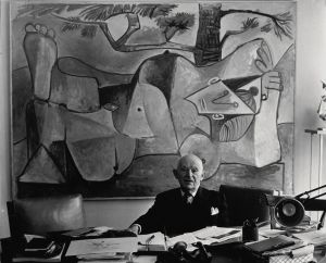 Kahnweiler in his office on rue Monceau, before a painting by Picasso, 1962